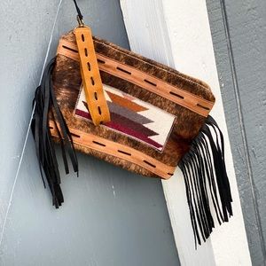 Cute leather and Pendleton wristlet
